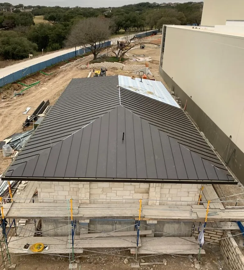Metal roof new construction with scaffolding in Burbank